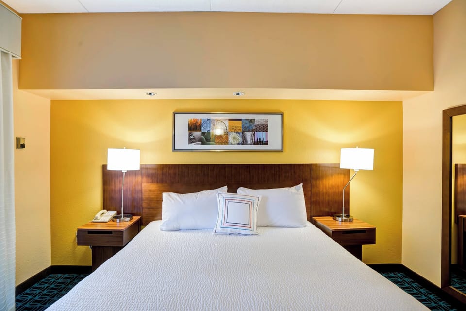 Premium bedding, down comforters, pillowtop beds, in-room safe