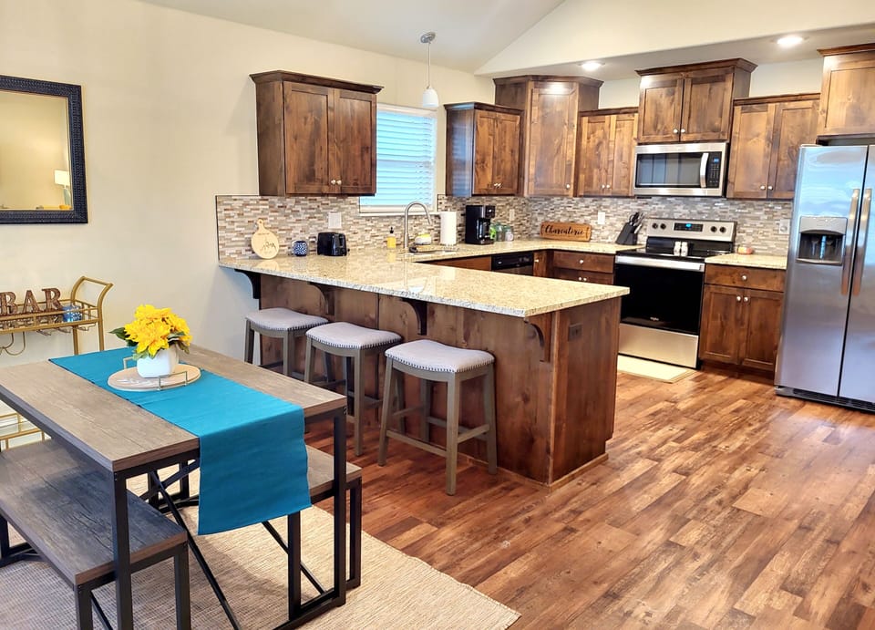 Enjoy a meal in the fully stocked kitchen. Plenty of seating at bar or table.