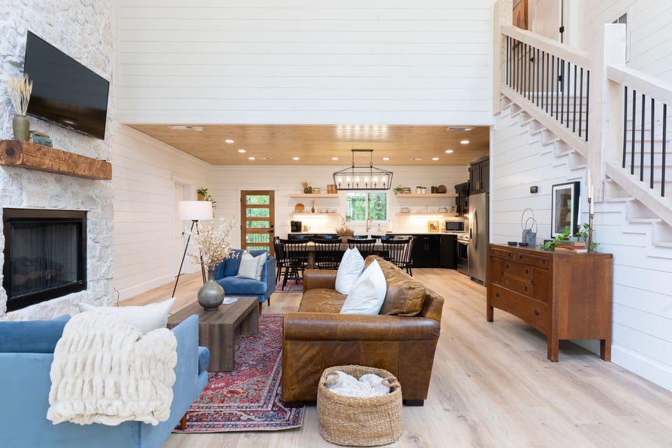 Enjoy the comfortable seating around the fire in the gorgeously designed living area