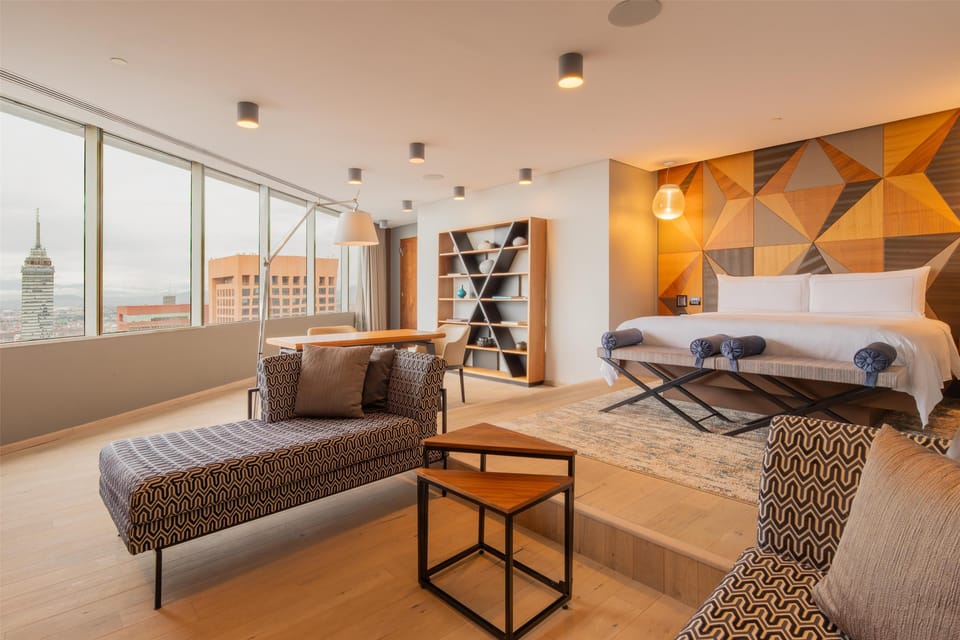 Presidential Suite 1 King Bed | Living area | Flat-screen TV, MP3 dock