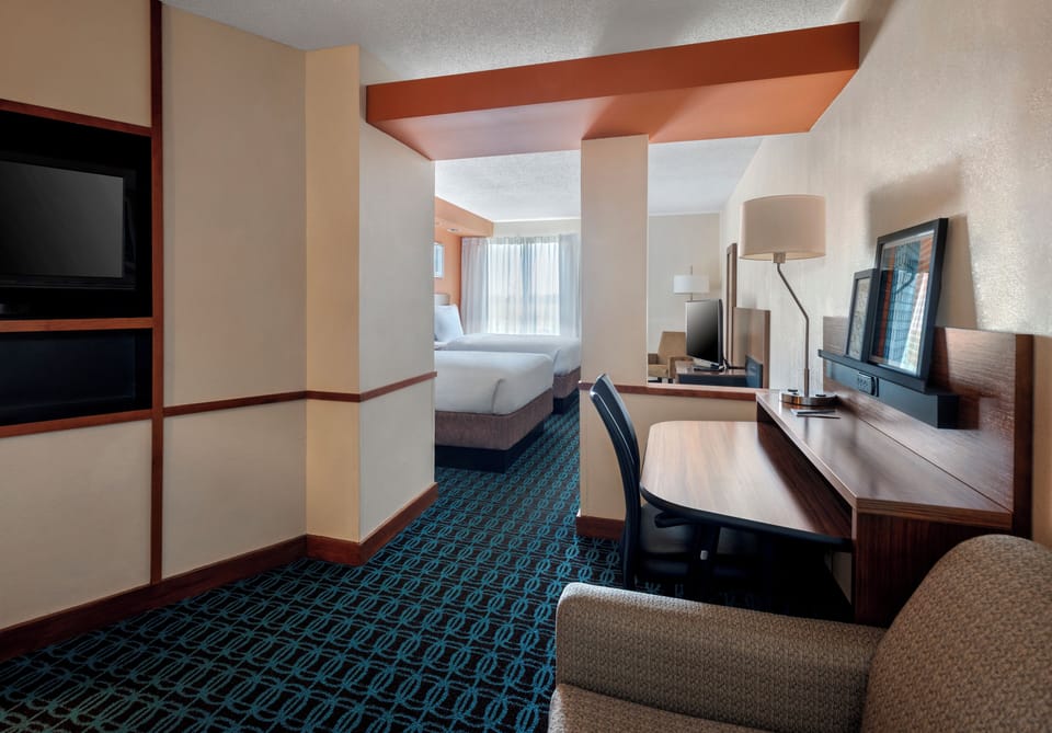 Executive Suite, Multiple Beds | Desk, blackout drapes, iron/ironing board, free cribs/infant beds