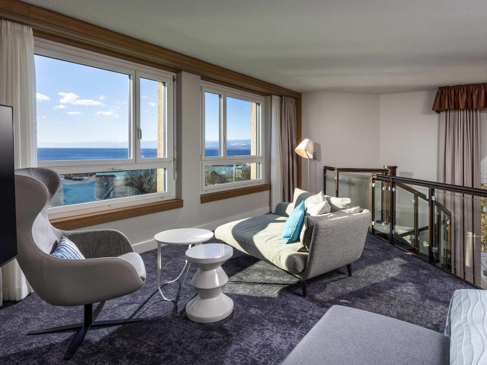 Suite, 1 King Bed, Lake View | Premium bedding, minibar, in-room safe, desk