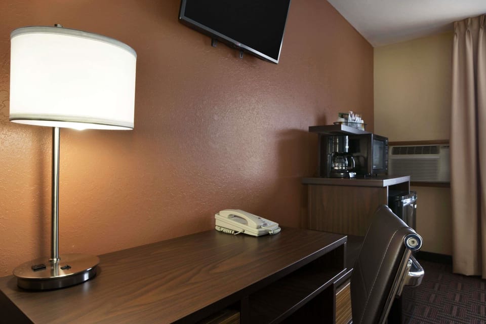Desk, blackout drapes, iron/ironing board, WiFi (free)