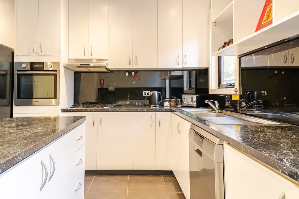 Full equipped kitchen. Double wall oven. Dishwasher & gas burners.