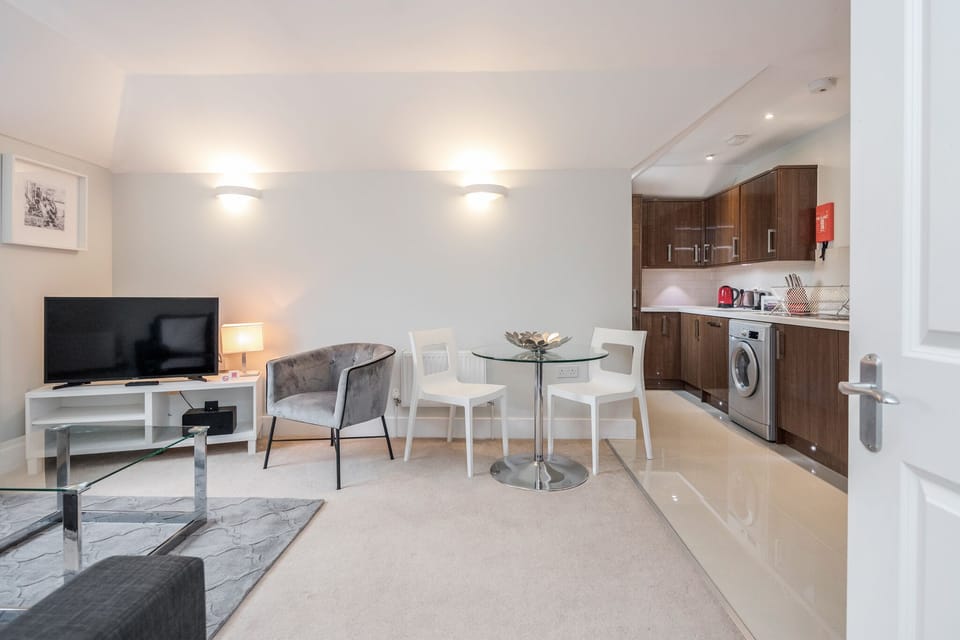 Standard Double Room | Living area | 40-inch Smart TV with digital channels, TV