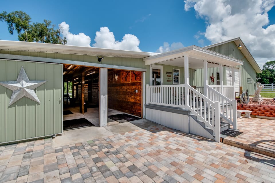 2 row horse stall barn with stalls tack room and feed room on both sides