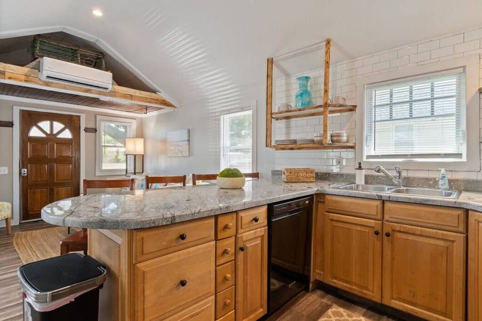 Kitchen island with black appliances