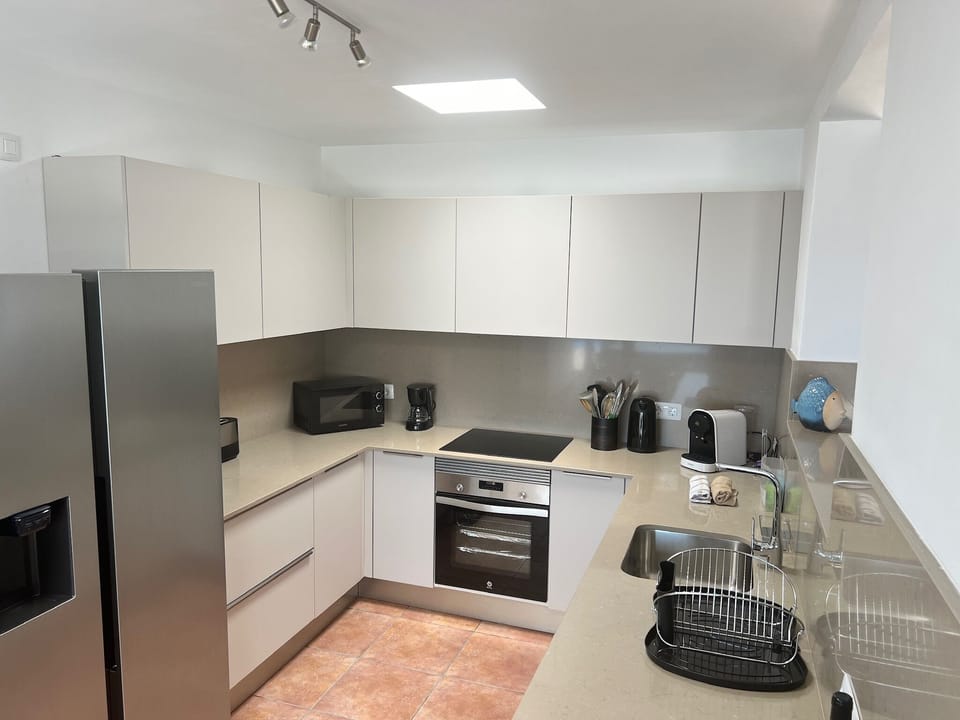 New kitchen with new appliances and granite worktop