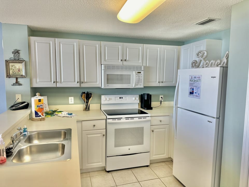 Fully Equipped Kitchen • Enjoy a Meal Indoors with a Beachfront views