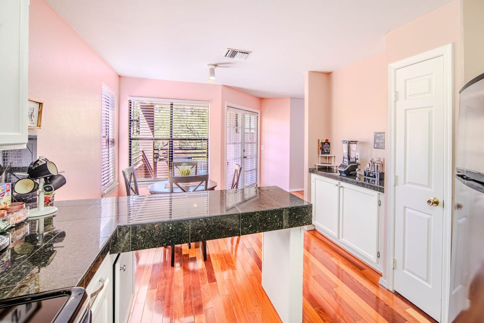 Whip up culinary masterpieces in the dine-in kitchen while entertaining.