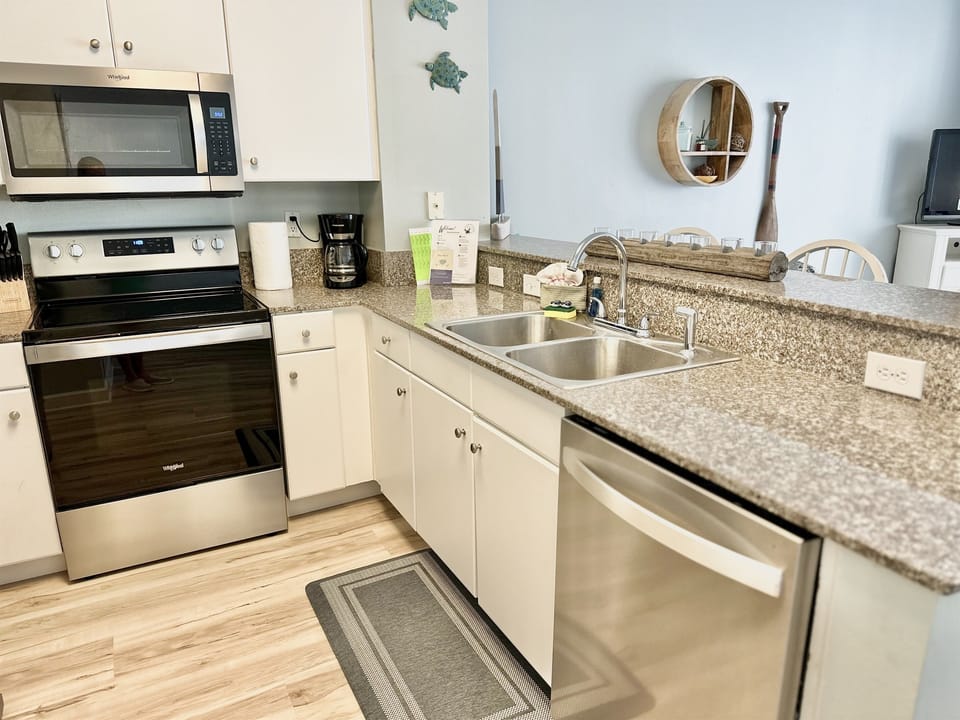 Fully Equipped Kitchen with Stainless Appliances • Granite Counters • Family Meals at the Beach
