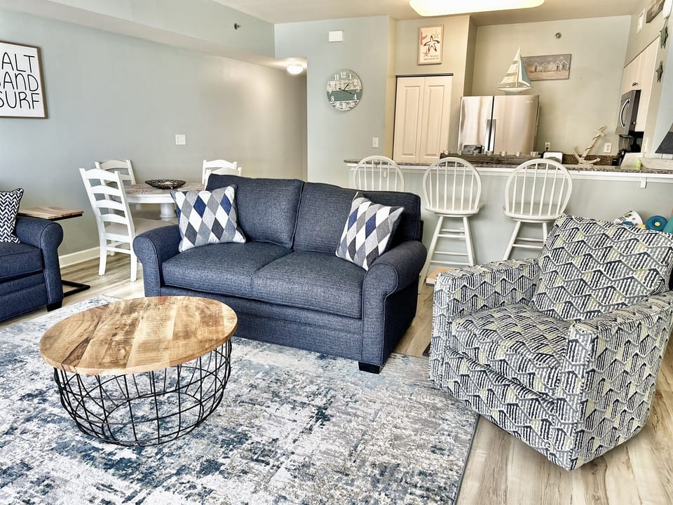 Beachfront Living Room • Queen Sleeper Sofa • Lagoon & Gulf Views • Smart TV • Family-Friendly Space