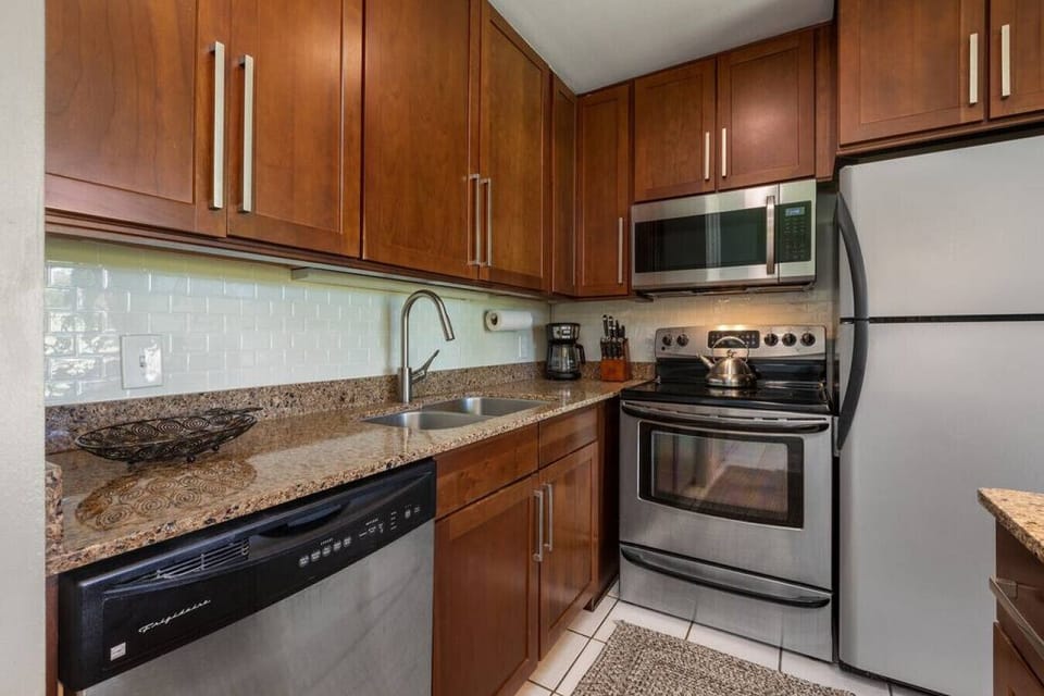 Practical kitchen w/ stainless appliances for easy meal prep