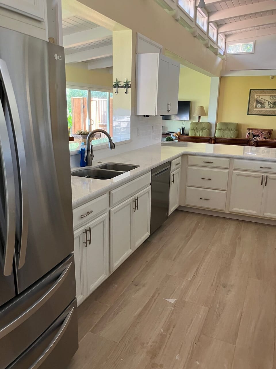 New Cambria 'Marble Look' quartzite counters w/ Subway tile.