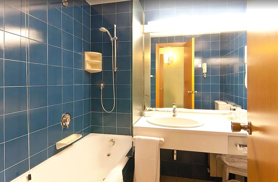 Free toiletries, hair dryer, bathrobes, slippers