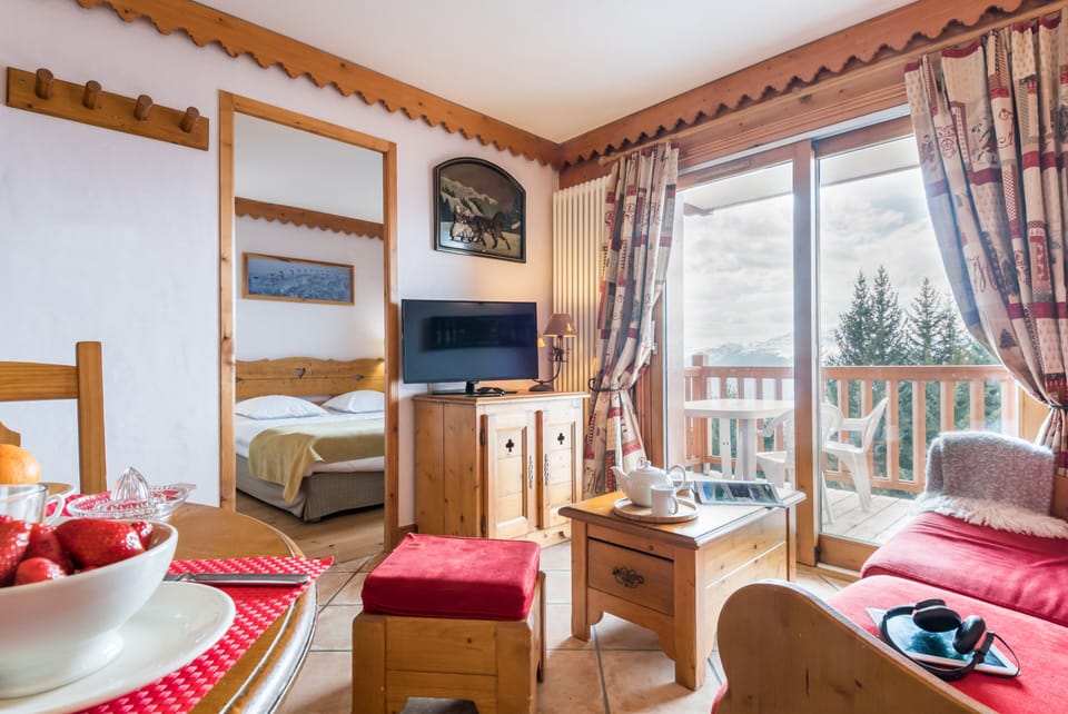 Appartement 5 personnes - 1 chambre + 1 coin nuit - Balcon | Living area | TV