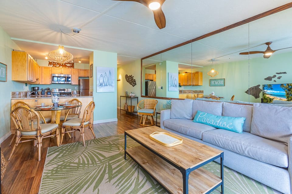 Beach days end beautifully in this inviting living space with sofa sleeper
