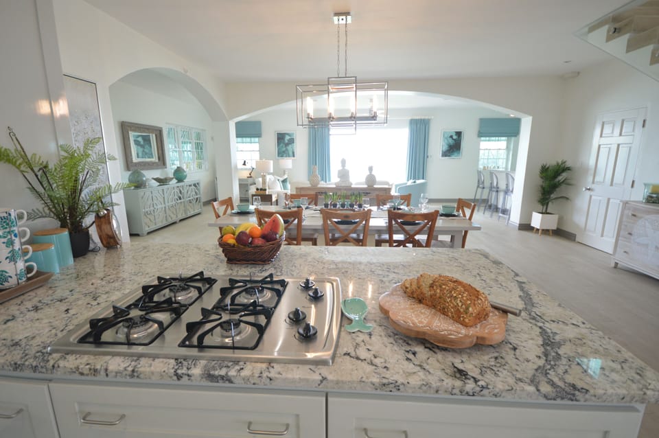 Kitchen view on looking the dining and living area
