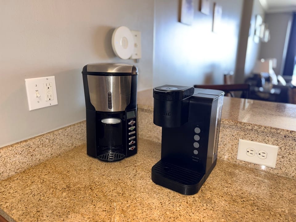 Regular and K-cup coffee makers in unit for guests