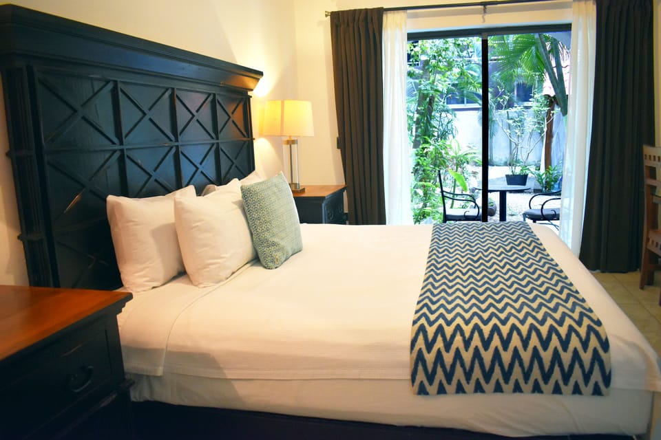 Room, Poolside | Premium bedding, in-room safe, individually decorated