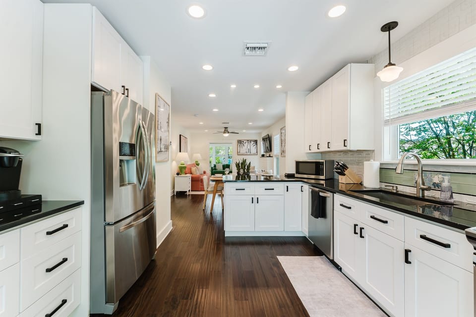 Thoughtfully equipped and beautifully appointed, the chef-inspired kitchen offers everything needed for preparing anything from beach-day snacks to gourmet dinners.