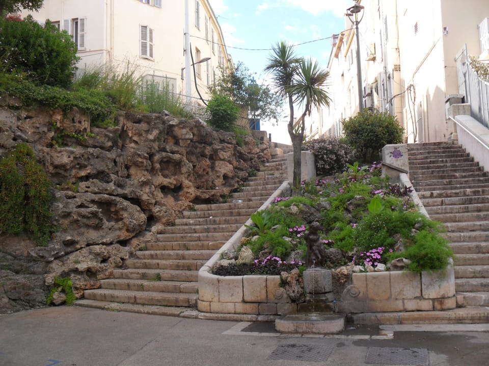 Steps in front of the house going down to the port