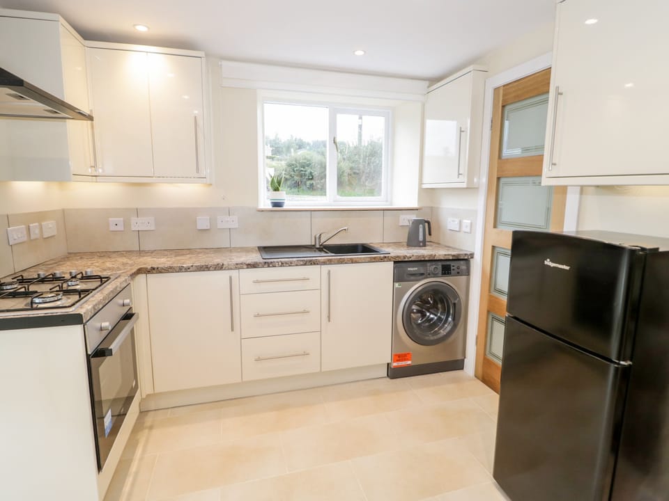 Fridge, electric kettle, toaster, cookware/dishes/utensils