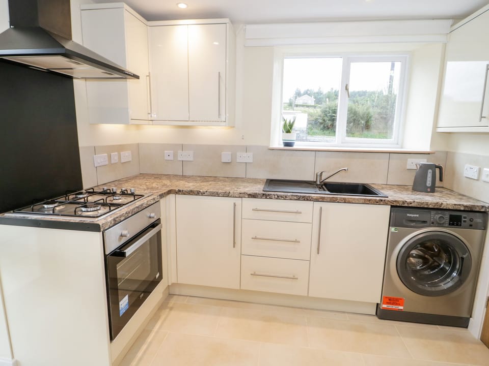 Fridge, electric kettle, toaster, cookware/dishes/utensils