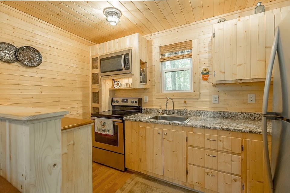 New, stainless steel appliances in the eat-in kitchen