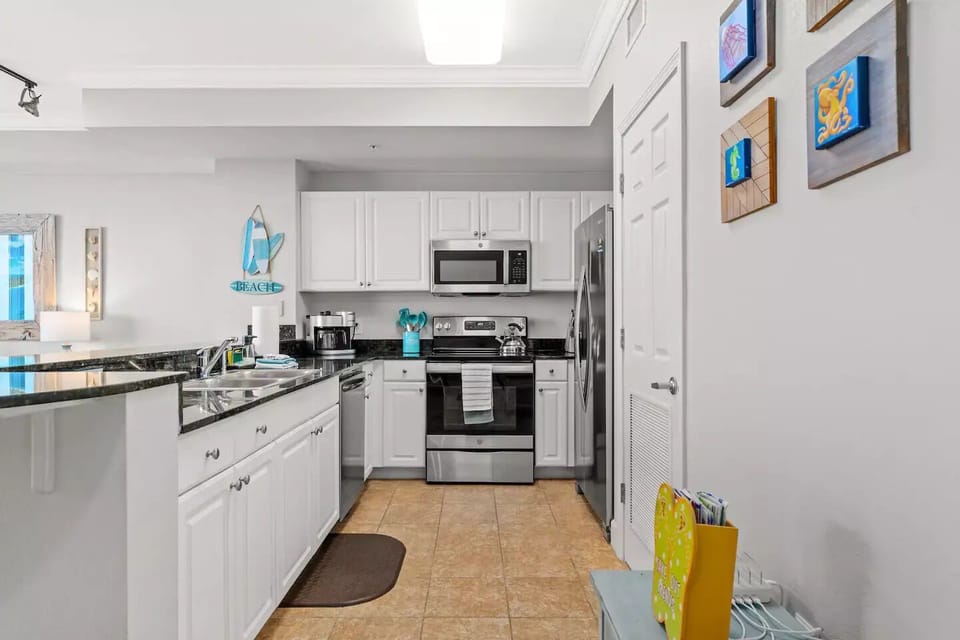 Kitchen with coffeemaker/blender and all the utensils needed for the chef