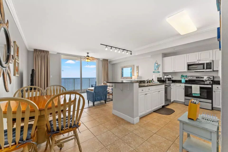 Open concept with direct views of the balcony and ocean. 