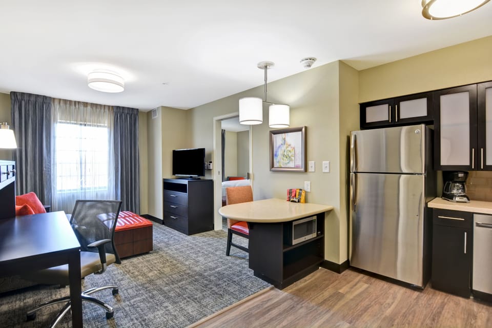 Open living area with a kitchen and sitting space.