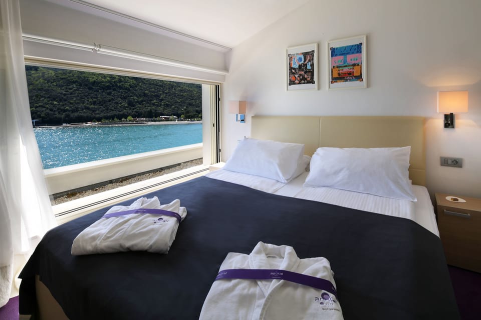 Superior Suite, Terrace, Sea View | Minibar, in-room safe, soundproofing, iron/ironing board