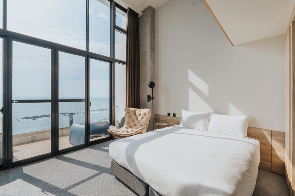 Signature Loft, Balcony, Ocean View | Down comforters, blackout drapes, free WiFi, bed sheets