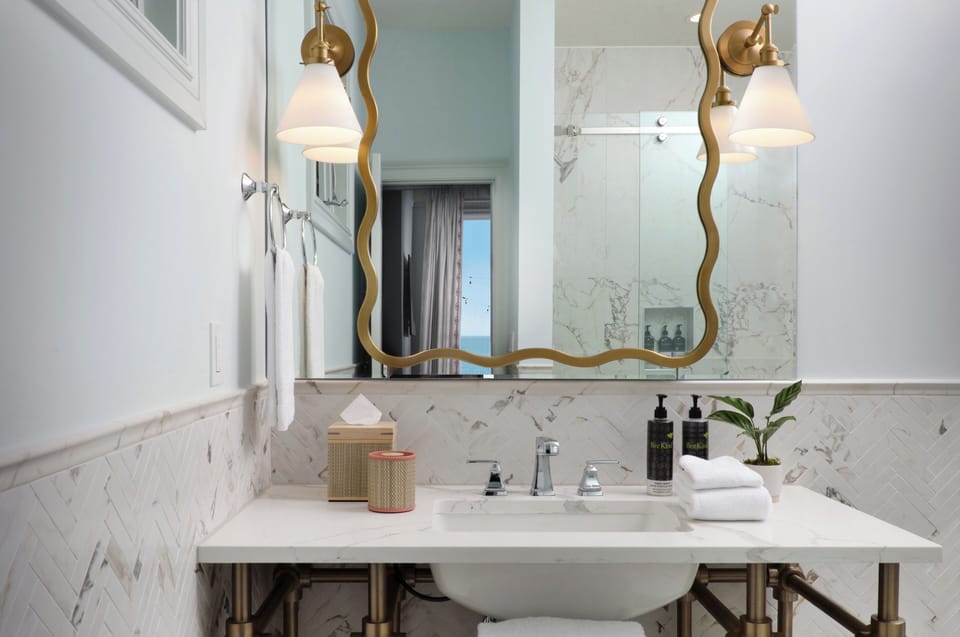 La Mer Dewey Island View King | Bathroom | Shower, hair dryer, bathrobes, towels