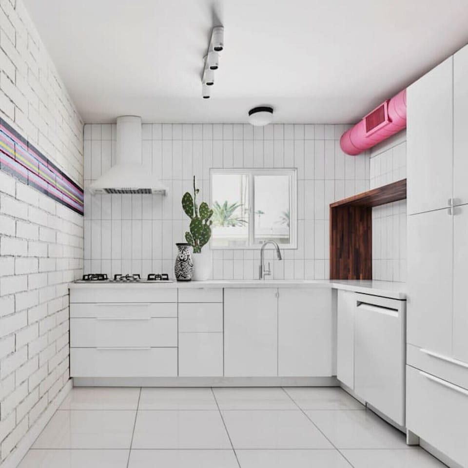 Kitchen is equipped with a stove, refrigerator, dishwasher, and microwave
