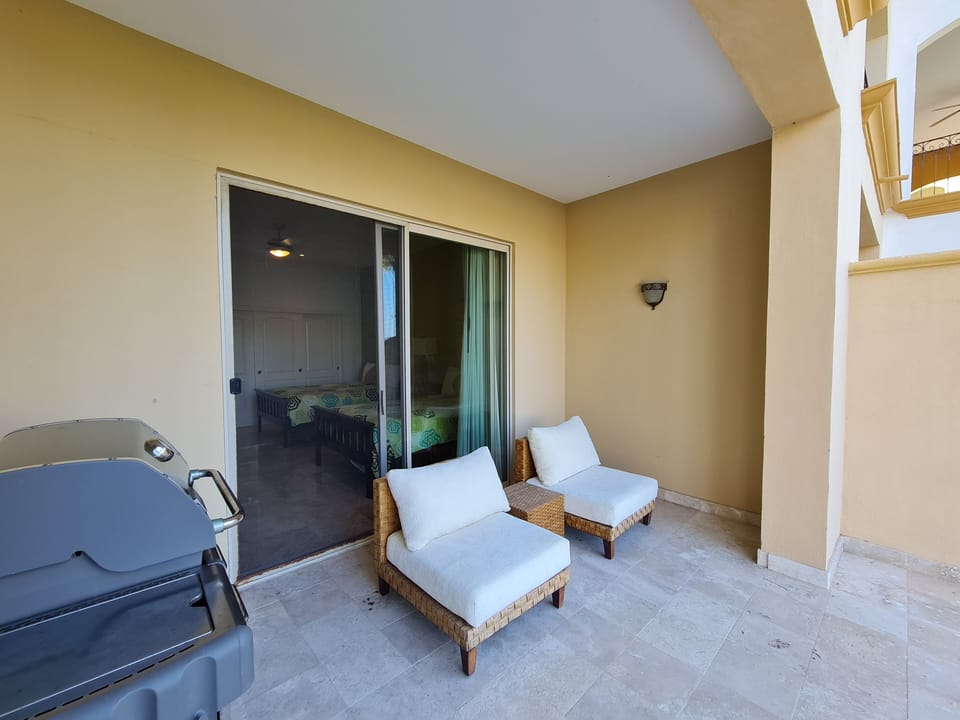 Guest bedroom's patio with BBQ grill