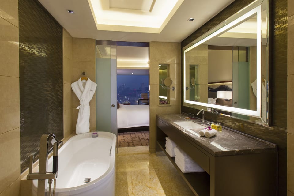 Separate tub and shower, deep soaking tub, rainfall showerhead