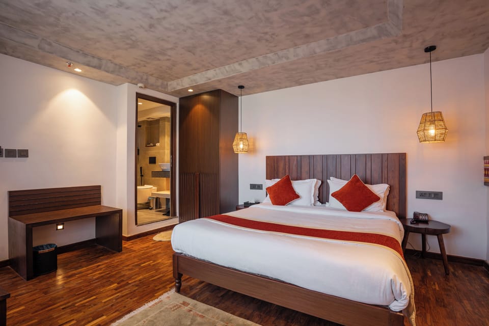 Deluxe Double Room | Desk, laptop workspace, blackout drapes, iron/ironing board (on request)