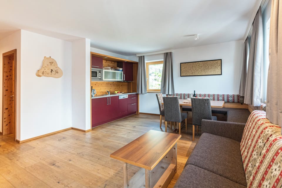 Apartment, 1 Bedroom, Balcony, Mountain View (App 6) | Living area | Flat-screen TV, toys