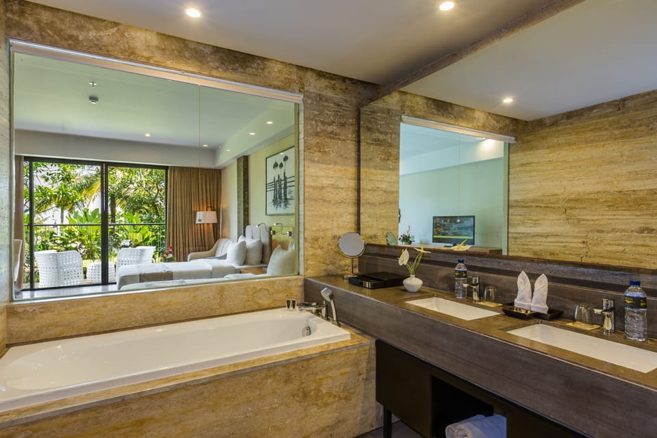 Separate tub and shower, hair dryer, bathrobes, towels