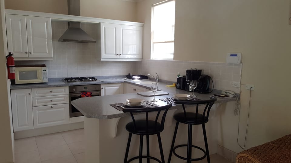 Deluxe Apartment, 1 Bedroom (Apt 5) | Private kitchen | Full-size fridge, coffee/tea maker, electric kettle