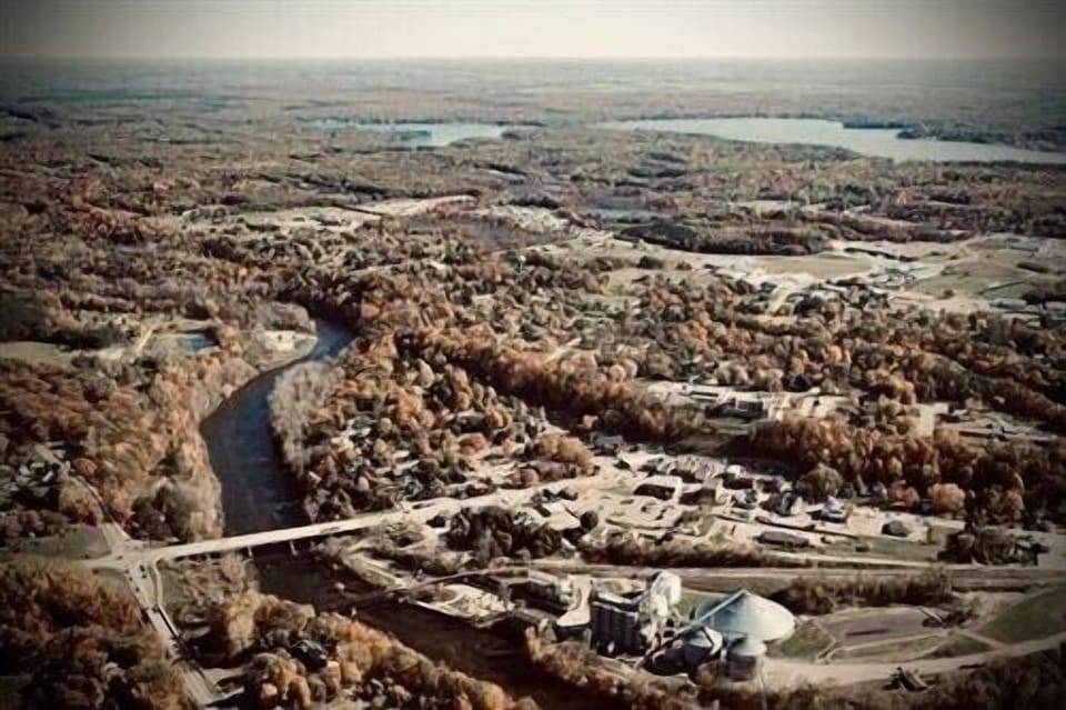 Aerial view over Muskegon River near downtown Newaygo 🛶 
