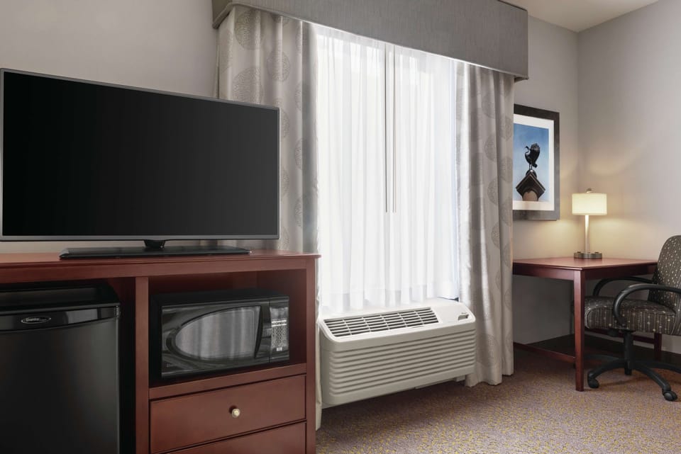Blackout drapes, iron/ironing board, free cribs/infant beds, free WiFi