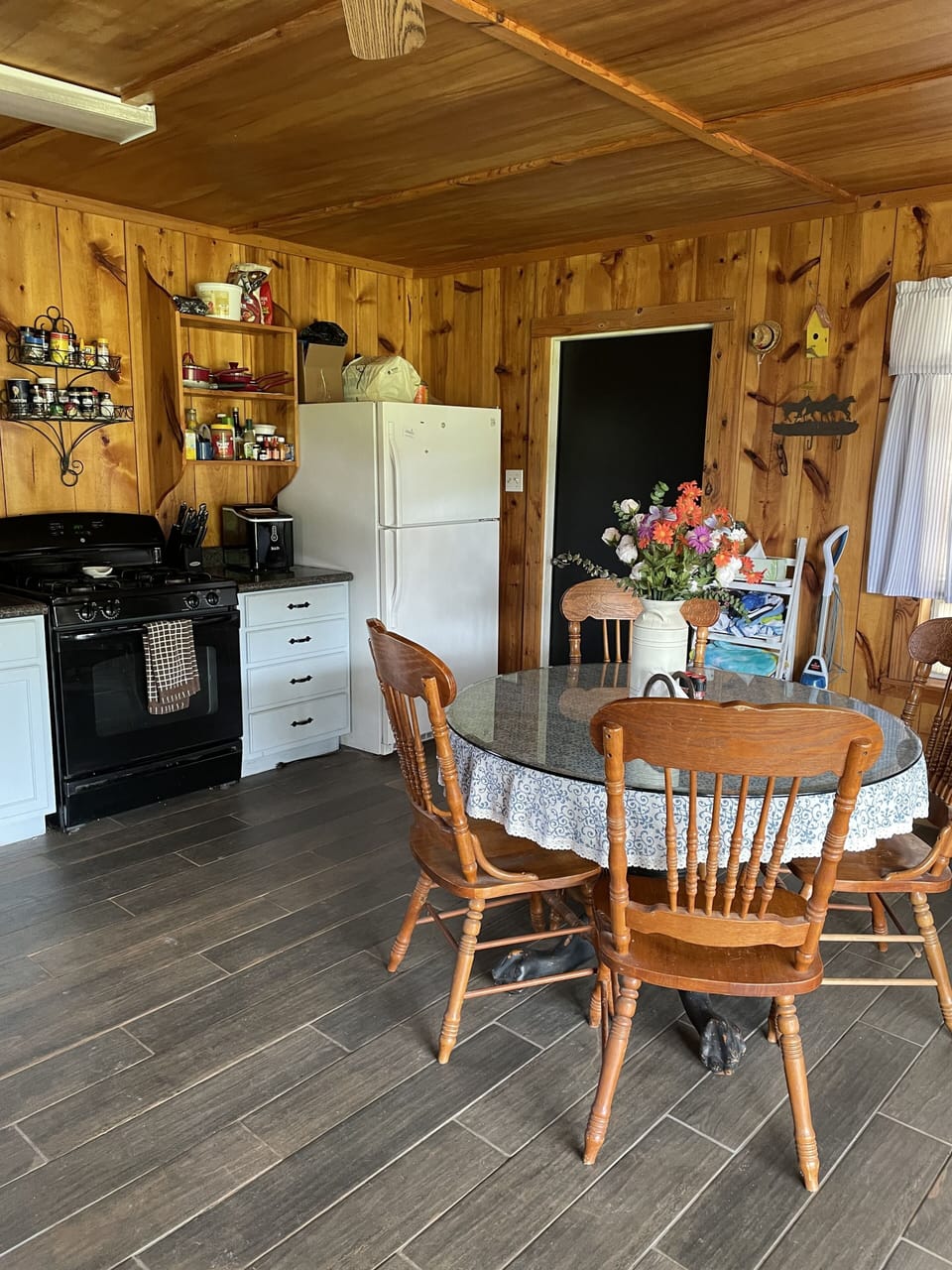 Full kitchen with gas range.