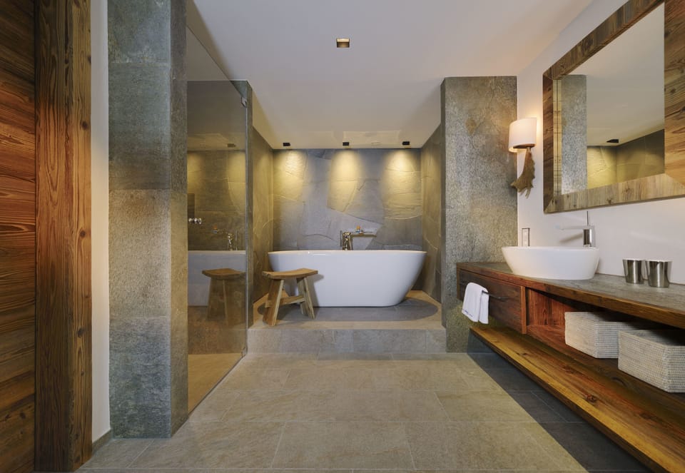 Designer toiletries, hair dryer, bathrobes, slippers