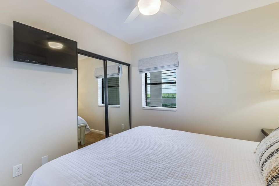 Third bedroom has queen-size storage bed and a smart TV