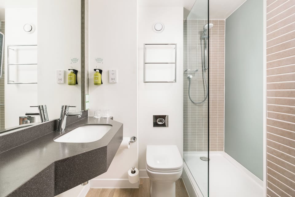 Combined shower/tub, eco-friendly toiletries, hair dryer, towels