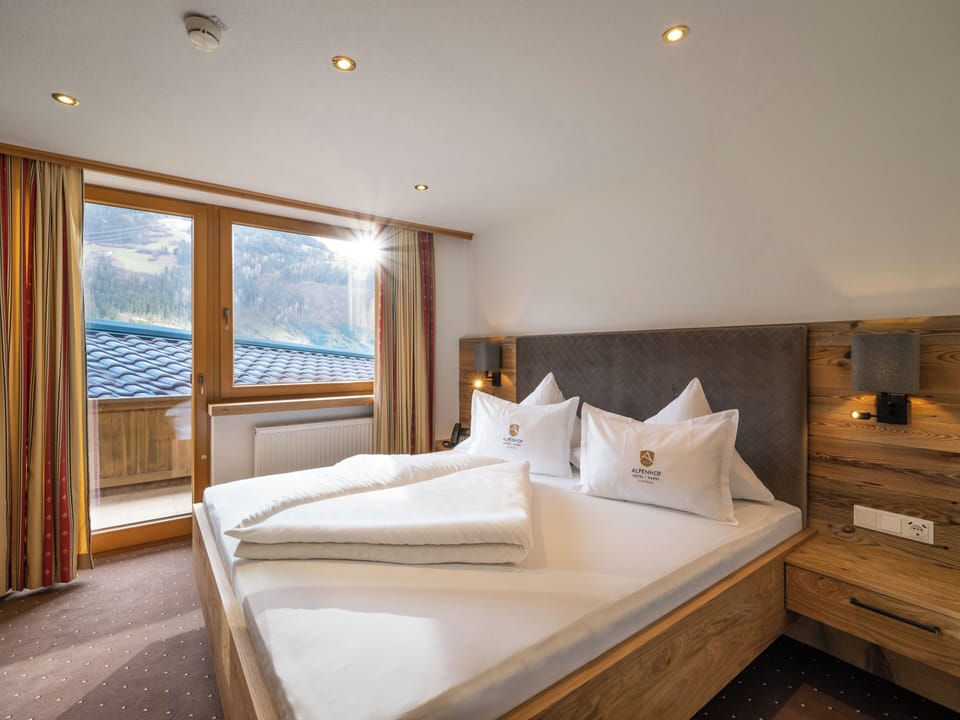 Premium bedding, memory foam beds, in-room safe, desk