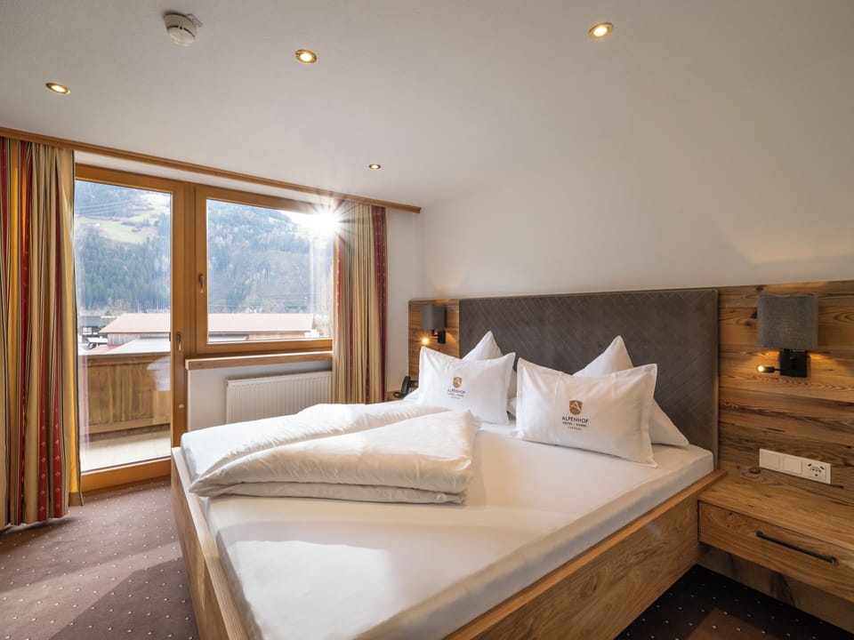 Premium bedding, memory foam beds, in-room safe, desk